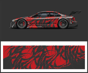 Abstract Red and Black Race Car Wrap Design