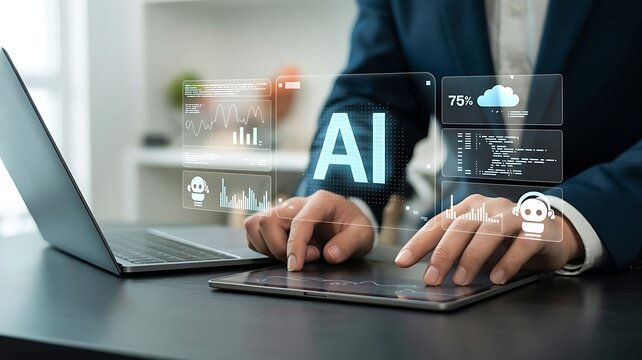 Person using tablet with ai interface overlay and laptop nearby desk