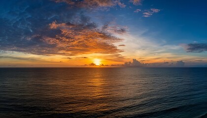 Breathtaking Ocean Sunset Landscape Dramatic Sky, Golden Hour Colors, and Tranquil Waters for Photography and Travel Inspiration