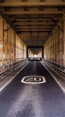 Speed limit sign painted on the road under the Tyne Bridge in Newcastle upon Tyne, England, United Kingdom