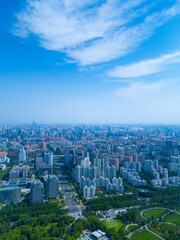 Aerial view of Shanghai skyline in Pudong new area on sunny day.