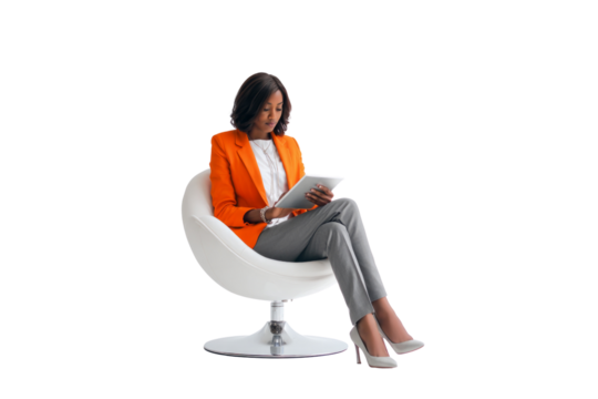 A woman in an orange jacket is sitting in a white chair and reading a tablet - Powered by Adobe