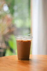 Coffee in a plastic cup to take home