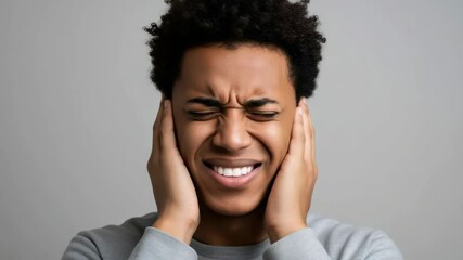 Group of friends clinking beer glasses, celebrating and toasting with bubbly golden lager at a pub or bar, cinematic footage.