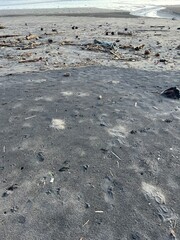 Black sand on the beach