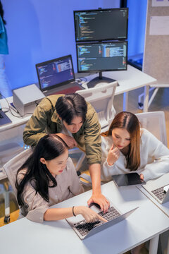 Professional computer engineer working on a new software technology design in the office Night, focus or programmer review search engine process, software or IT database development