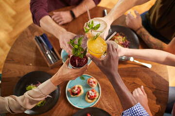 Friends Toasting with Drinks