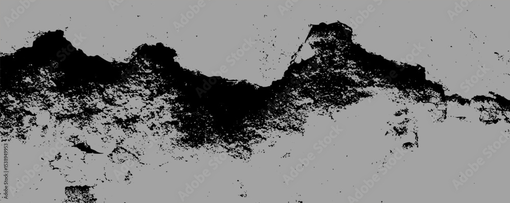 Poster a rough, textured surface shows deep black stains that create a striking contrast against a muted ba