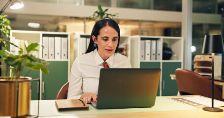 Business, night and woman in workplace, laptop and online reading with email, investment and economy. Person, evening and financial advisor in office, pc and internet with stock market and trading