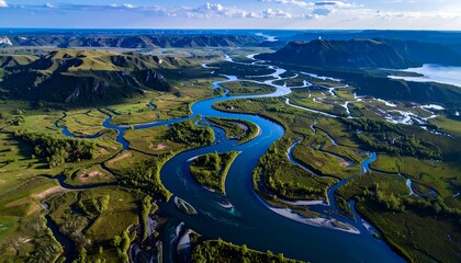 Aerial View of Meandering River in Vibrant Lush Valley Landscape
