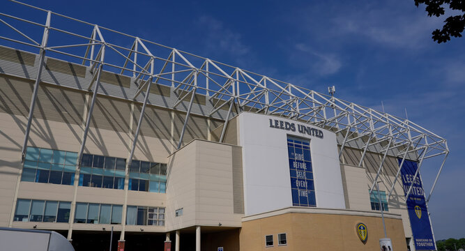 LEEDS, UK - JUNE 12, 2025 - Elland Road stadium, home of Leeds United Football Club, showing its impressive architecture under a clear blue sky