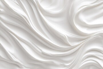 Naklejka premium Swirling, creamy white substance forms elegant, flowing waves and folds, creating a luxurious, smooth texture