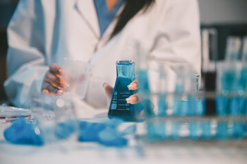 Research, experiment and medical trial being done by a scientist in a lab, science facility or...