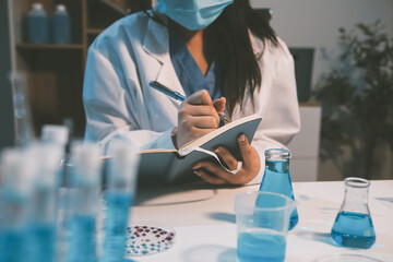 Research, experiment and medical trial being done by a scientist in a lab, science facility or...