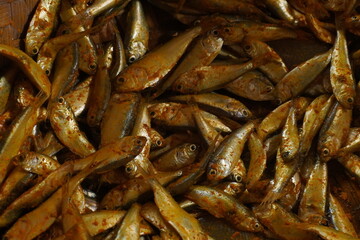 Crispy fried fish with golden-brown coating and tender, flavorful meat, perfect for seafood lovers, served hot with sauces or side dishes