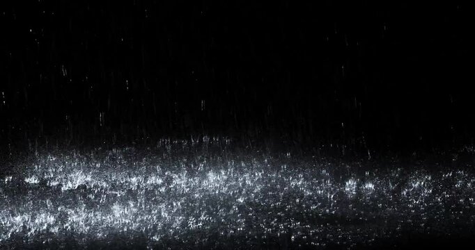4k Rain over black background, realistic rain can be use in your composition, Rain hits the ground effect, Splashing rain - Powered by Adobe