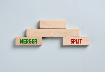 Merger and split concept with wooden blocks bridge