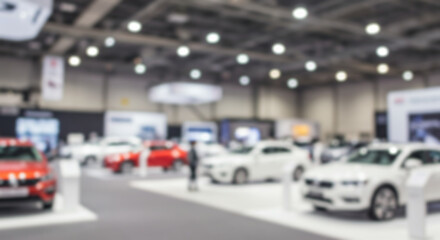 Immersive Auto Show Experience Exploring the Latest Car Models and Innovations at a Major Automotive Exhibition Blurred Background Image
