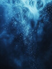 Abstract blue underwater scene with particles.