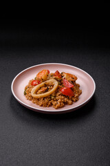 Rice and prawns or paella, a meal with seafood and vegetables. Cooked rice with shrimp