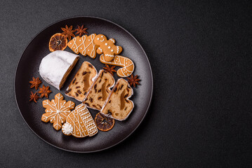 Christmas Stollen, a German sweet cake with marzipan and fruit. Winter Christmas Stollen