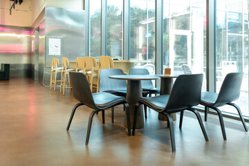 Interior of a nice modern cafe with cozy chairs