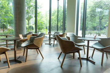 Interior of a nice modern cafe with cozy chairs