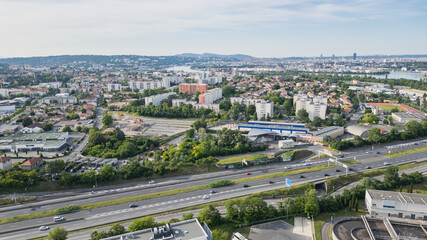  Panoramic cityscape of Lyon, France, with visible wastewater treatment plant in the corner – urban infrastructure and environmental sustainability concept