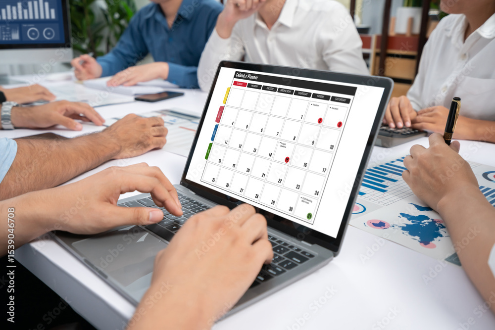 Poster calendar on computer software application for brisk schedule planning for personal organizer and onl