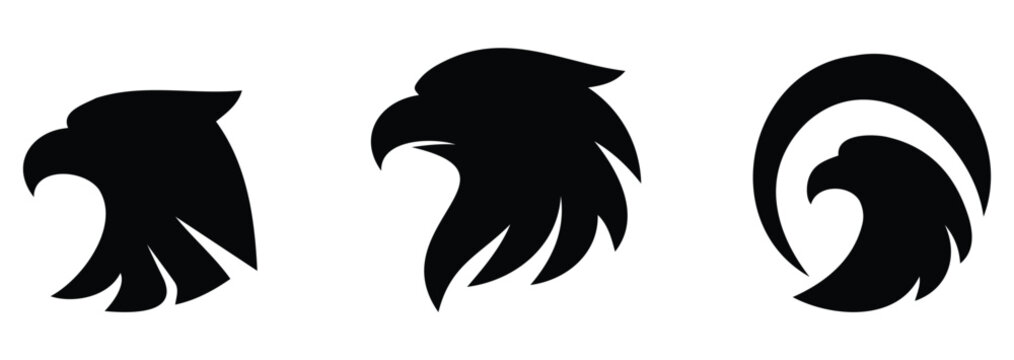 Set of stylized eagle head silhouettes with fierce expressions and bold lines, ideal for logo and tattoo designs