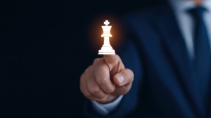 Businessman Holding Chess Piece Symbolizing Strategy and Leadership for Success in Corporate World