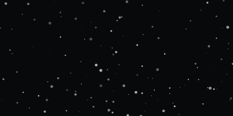 a dark background with scattered small white dots that resemble stars in the night sky.