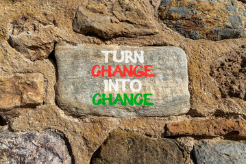 Turn change into chance symbol. Concept words phrase Turn change into chance on beautiful grey stone wall. Beautiful stone wall background. Business Turn change into chance concept. Copy space.