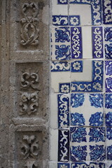 detail of a blue and white tiled wall