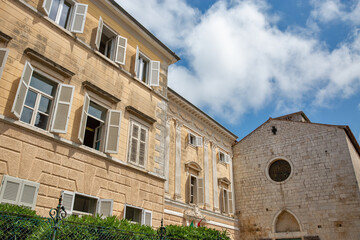 Fototapeta premium Historic european building and old stone church. Porec, Croatia.