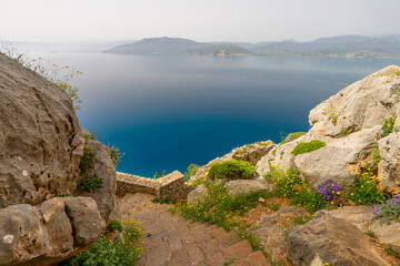Greece, Nafplio, Palamidi Fortress - 1 april 2024 - View of a staircase and the gulf of Nafplio from the fortress of Palamidi