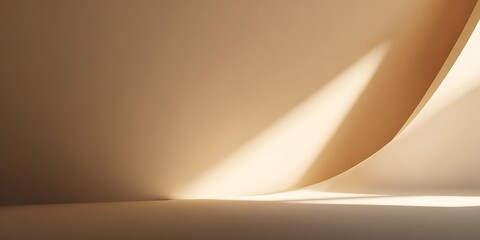 Beige studio background with soft light and shadows creating a minimalist and elegant backdrop effect
