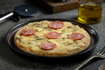 Small personal pizza. Calabrian sausage pizza.