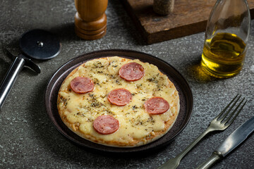 Small personal pizza. Calabrian sausage pizza.