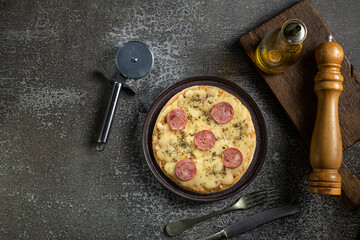 Small personal pizza. Calabrian sausage pizza.