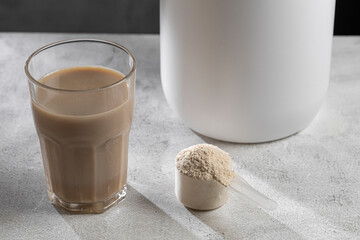 Protein shake. Chocolate flavored protein powder, dietary supplement.