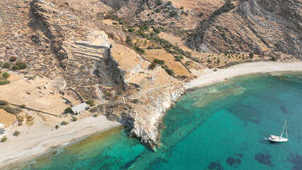 Aerial drone photo of archaeological seaside site of ancient Karthaia featuring Doric temple of Pythian Apollo, theatre and crystal clear beach of Polles in island of Kea, Aegean Sea, Cyclades, Greece
