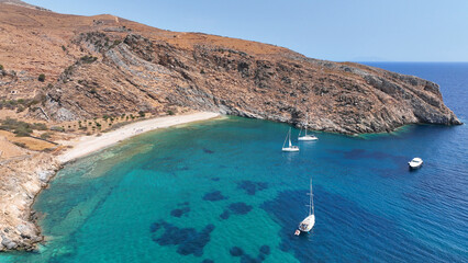 Aerial drone photo of archaeological seaside site of ancient Karthaia featuring Doric temple of Pythian Apollo, theatre and crystal clear beach of Polles in island of Kea, Aegean Sea, Cyclades, Greece