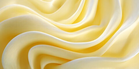 Fototapeta premium Close up of flowing creamy yellow fabric forming soft waves and elegant folds in a smooth pattern