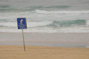 Surf's up at the secluded beach with waves inviting adventurous surfers