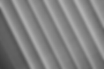 Abstract pattern of diagonal lines in soft gradient lighting