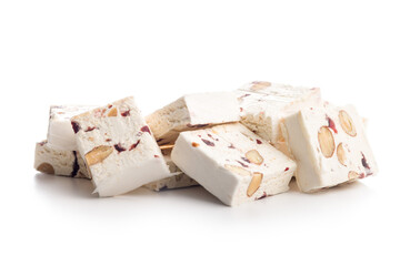 White nougat bars with almonds and dried fruit isolated on white background.