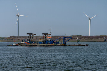 dredger is anchored in the North Sea Canal in the Netherlands