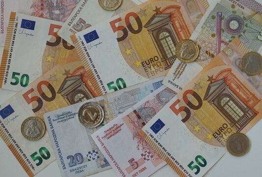 Mixed euro and Bulgarian leva banknotes, coins. Currency mix illustrates concept of exchange, finance and economy. Bulgaria joining euro zone, exchange of Bulgarian lev money for Euro