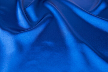 Blue satin or silk fabric as background